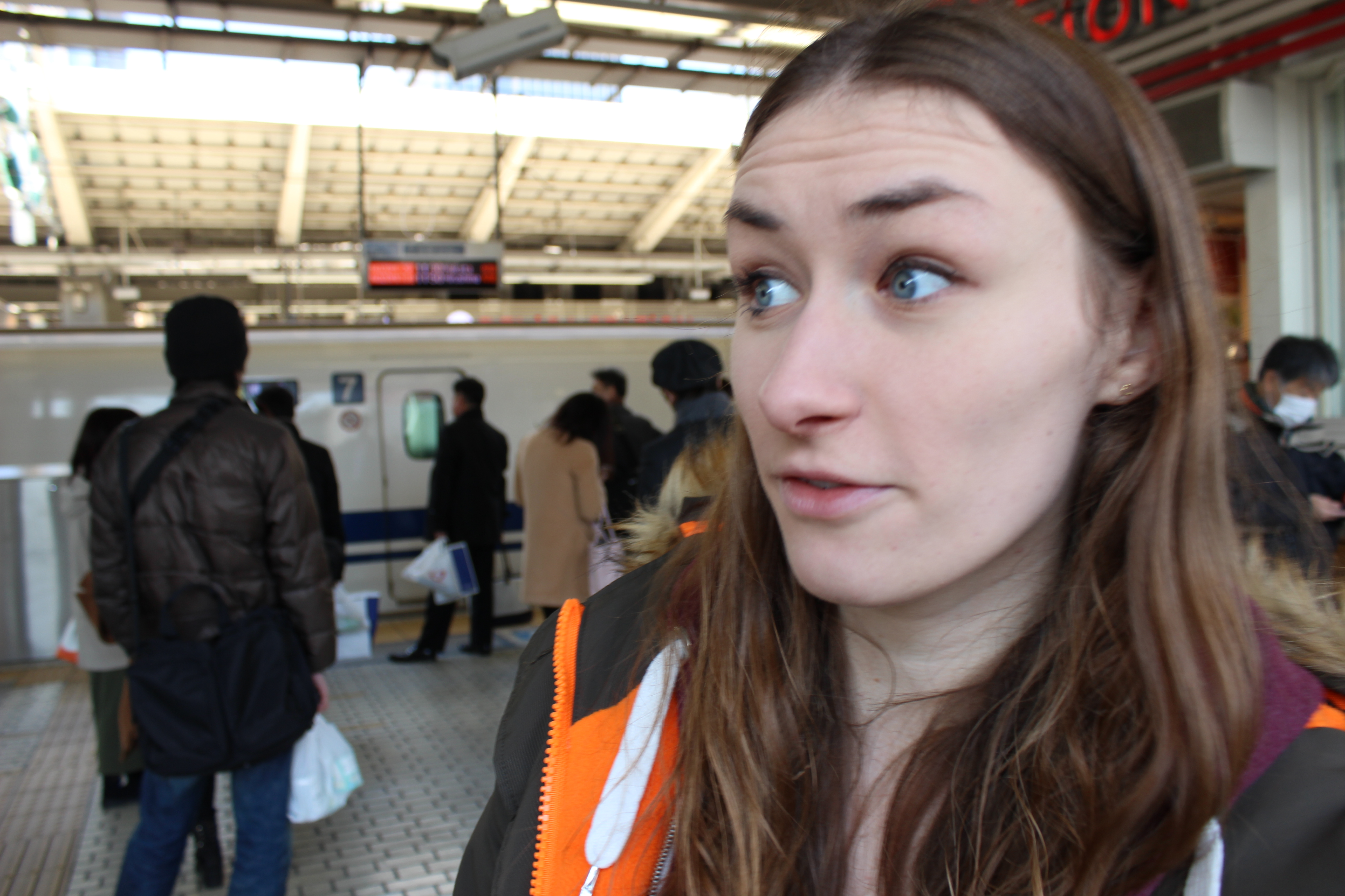 Waiting for the train and Sarah spots the Shinkansen